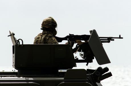 British Army Personnel in a heavy artillery tank